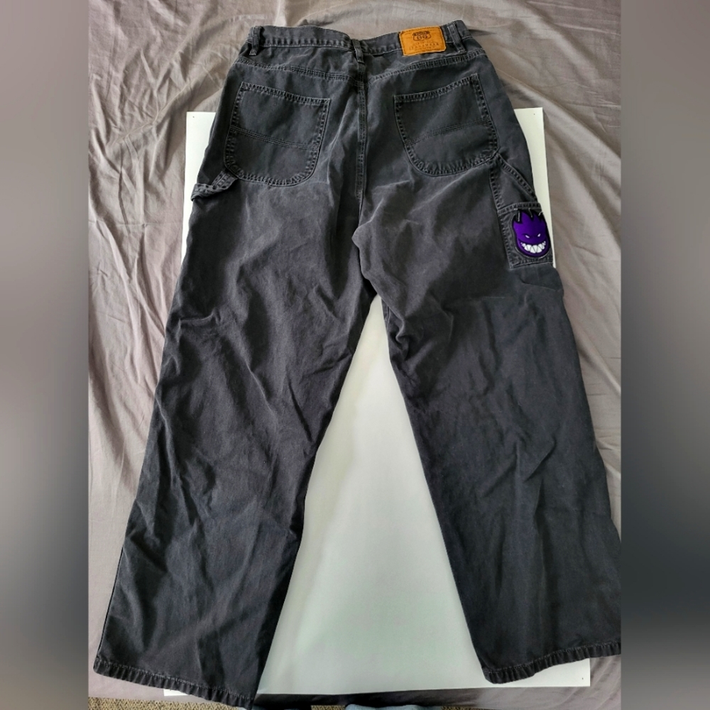 Route 66 black baggy pants with purple Spitfire patch size15/16